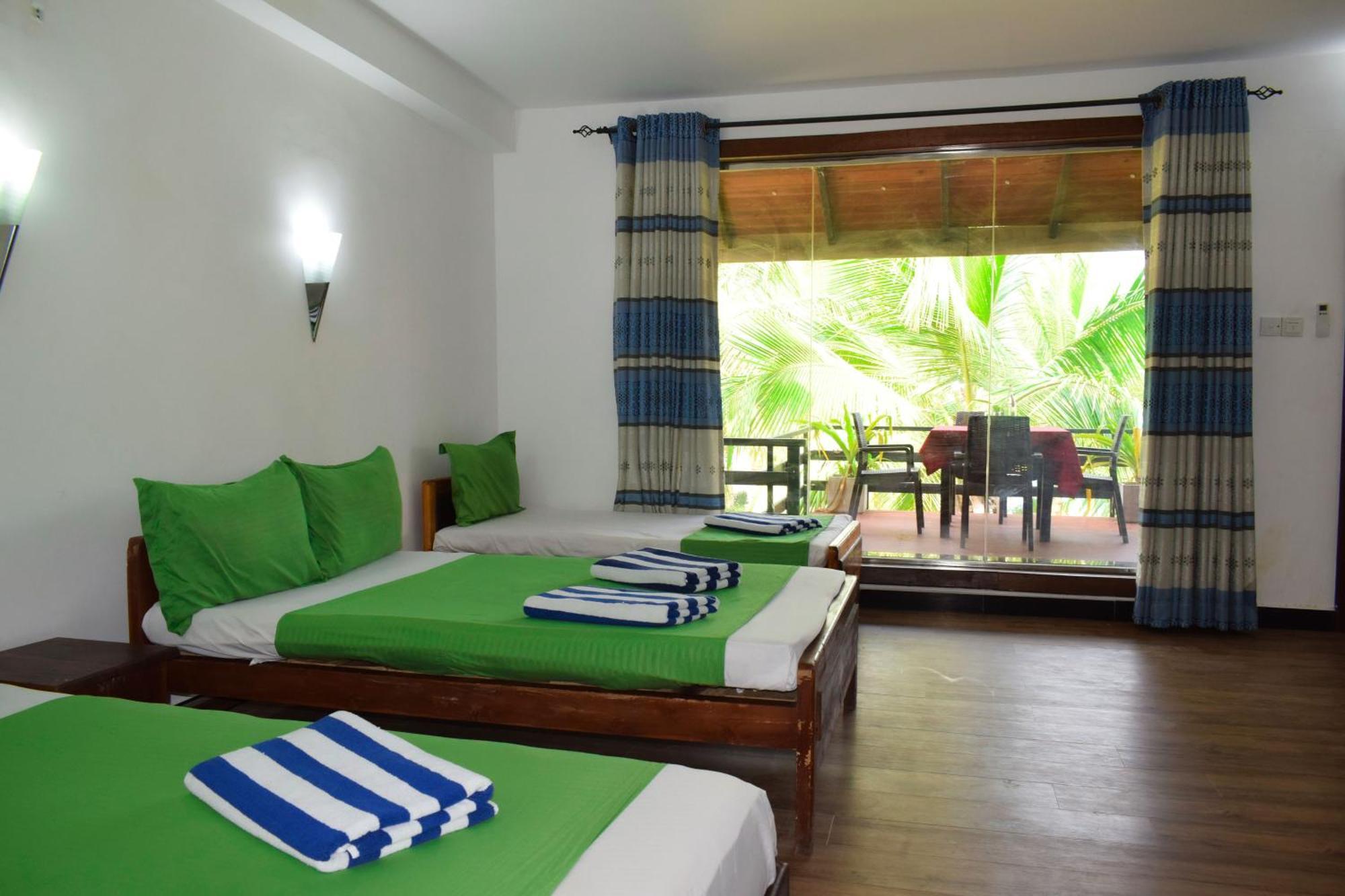 Hotel Green Garden تريكونامالاي المظهر الخارجي الصورة