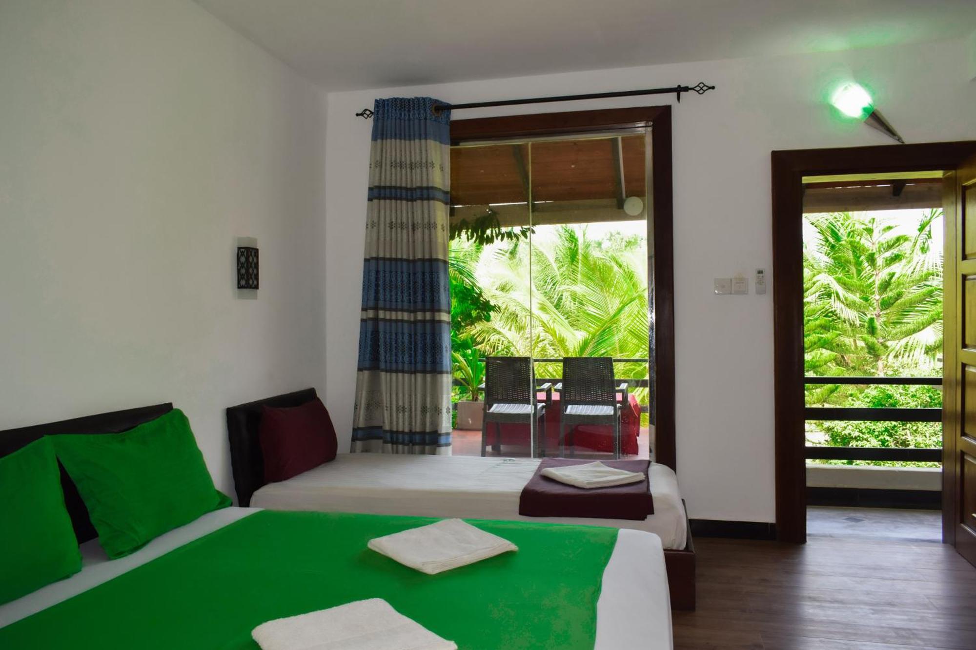 Hotel Green Garden تريكونامالاي المظهر الخارجي الصورة